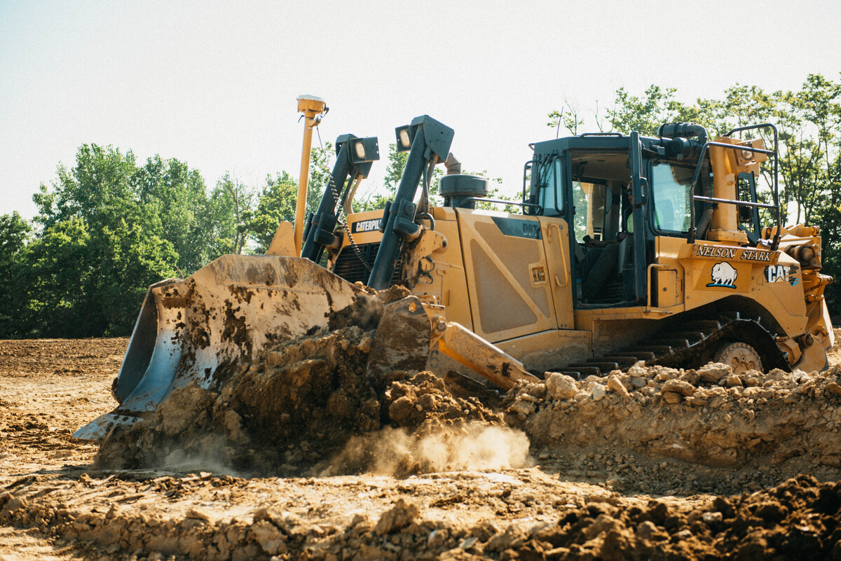 Bulldozer pushing dirt